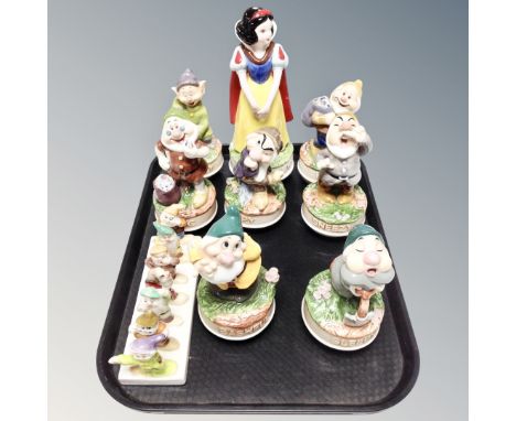 A collection of Snow White and the Seven Dwarf musical figures, issued by Schmid together with Snow White and Seven Dwarfs to