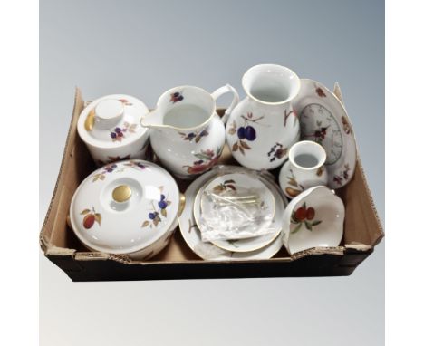 A box containing eight pieces of Royal Worcester Evesham to include vases, cake stand, wall clock, storage jar etc. 