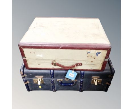 A vintage wooden bound travelling trunk together with a further vintage suitcase. 