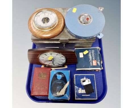 Tray of collectable items including a Metamec clock, post office saving bank, a padlock, cigarette lighter, tape measure etc.