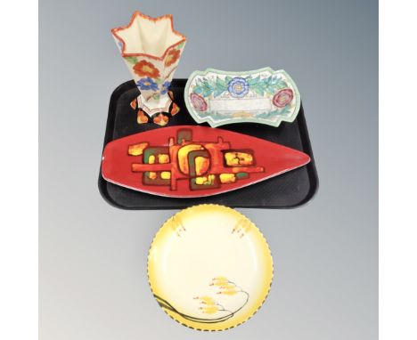 A tray containing shaped Poole pottery plate, a hand painted Art Deco jug, together with a further Crown Ducal dish and a Bur