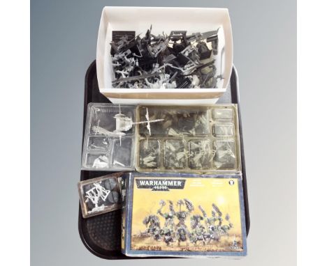 A tray containing a collection of plastic and lead Games Workshop Warhammer figures. 