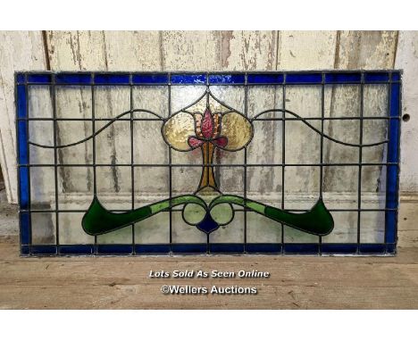 A large Art Nouveau stained glass panel. 58cm x 117cm. C1925 