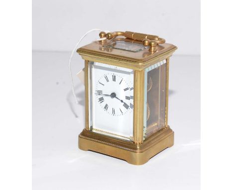 An early 20th Century French gilt cased carriage clock, in glazed case, 10cms high overall.