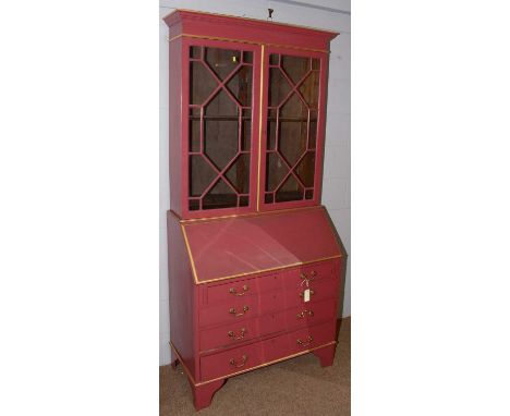A later painted Edwardian oak bureau bookcase, with double astragal glazed doors enclosing shelved interior, fall front enclo