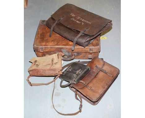 Late 19th/Early 20th Century leather travel trunk, inscribed 'S.C. Edgar'; together with a brown leather satchel; a brown lea