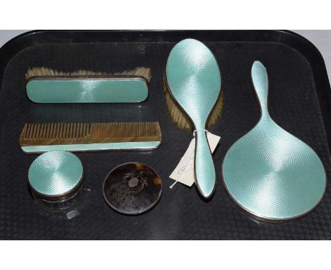 A six-piece dressing table set, decorated in mint guilloche enamel, comprising: jar, etc.