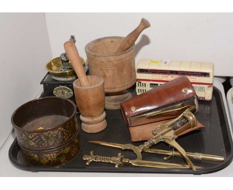 An assorted selection of collectables, including: two turned wood pestles and mortars, various; a brass and cast metal coffee