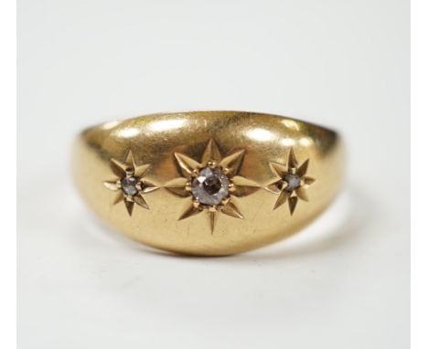 A George V 18ct gold and three stone gypsy set diamond chip set ring, size R, gross weight 3.3 grams.