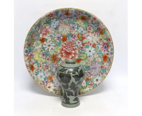 A Chinese millefleur enamelled porcelain dish, six character Qianlong seal mark, but late 19th/early 20th century, 38cm diame