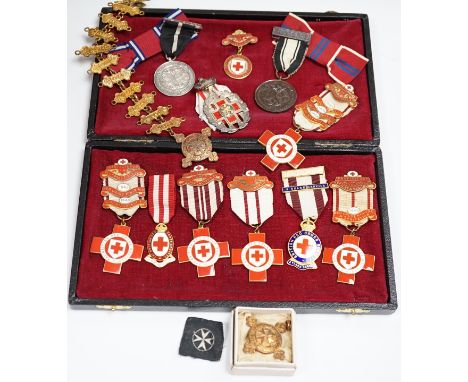 A collection of British Red Cross, etc. medals, awards and memorabilia including medals in original card boxes, a WWII medal 