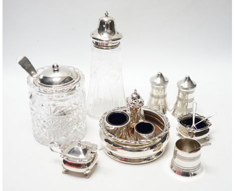 An Edwardian silver wine coaster, William Hutton &amp; Sons, Birmingham, 1903, diameter 10.4cm, a later silver three piece co