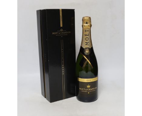 A Bottle of Moet and Chandon Grand Vintage 2000 champagne with box