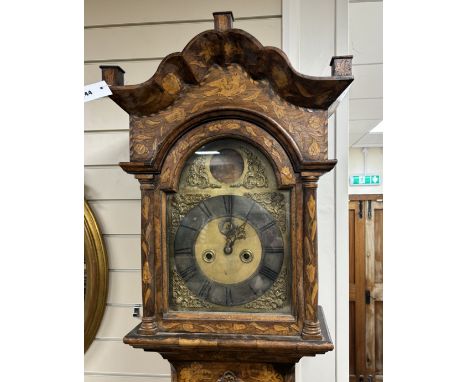 A 19th century Dutch floral marquetry walnut eight day longcase clock, the arched dial marked John Wood, Grantham, height 226