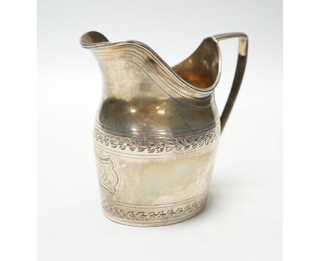 A George III silver engraved helmet shaped cream jug, Godbehere &amp; Wigan, London, 1796, 10cm, 5.3oz.