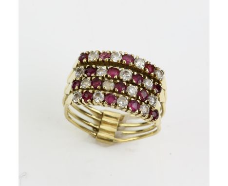 Ruby and cubic zirconia harem ring, consisting of four rings, each with alternating cubic zirconias and rubies, claw set, mou