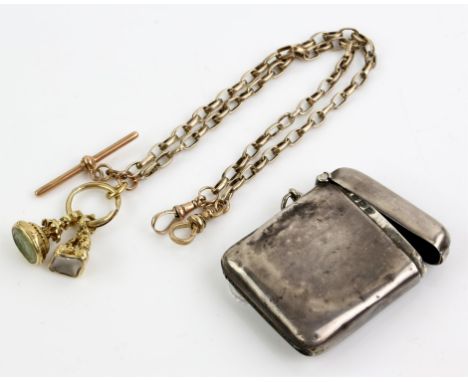 A gold fob chain with two seals and T-bar, in stamped 9 ct, and a silver vesta caseCondition Report:  Gross weight of 9 ct 30