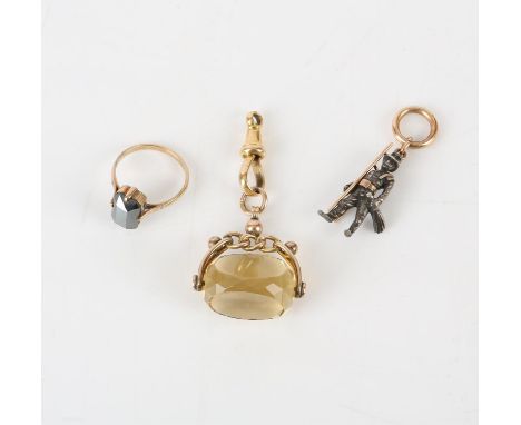 A citrine swivel fob pendant, mounted in 9 ct gold with a with an 18 ct gold clasp, a chimney sweep pendant in silver, carryi