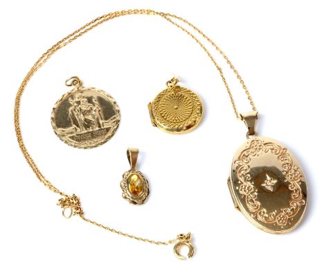 Selection of four pendants, including an oval locket pendant, set with a small diamond to the centre, with ornate scroll desi