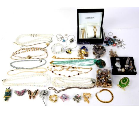 Selection of silver and costume jewellery, including a hinged bangle, a charm bracelet, a heart bracelet, St Christopher pend