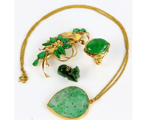 Collection of jade jewellery, including an openwork floral design brooch, 60 x 30mm, a pear shaped pendant necklace, 38 x 29m