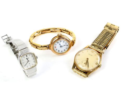 A ladies gold wristwatch, white enamel dial with Arabic numeral hour markers, fitted with a manual wind movement, the case ba