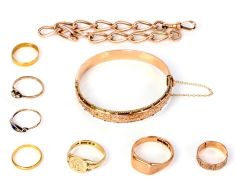 Collection of gold jewellery, including a hinged bangle with a rope border and foliate engraved design, a fancy link bracelet