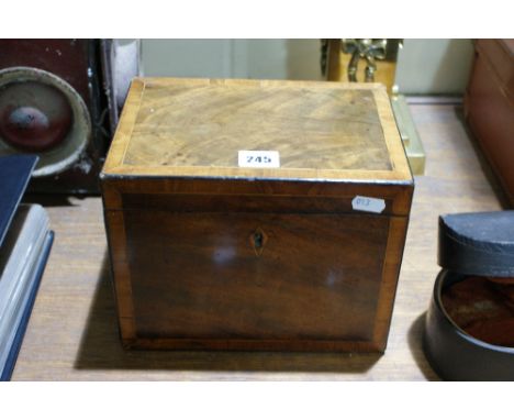 A 19th Century Mahogany And Cross Banded Tea Caddy