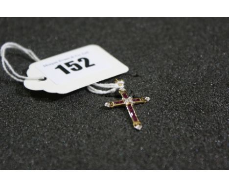 A Nine Carat Gold Ruby And Diamond Set Crucifix Pendant