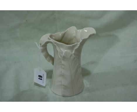 A Royal Worcester White Glazed Leaf Jug