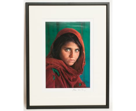 STEVE MCCURRY (AMERICAN b. 1950),
AFGHAN GIRL (THE GIRL WITH THE GREEN EYES)
offset lithographic colour print, signed lower r