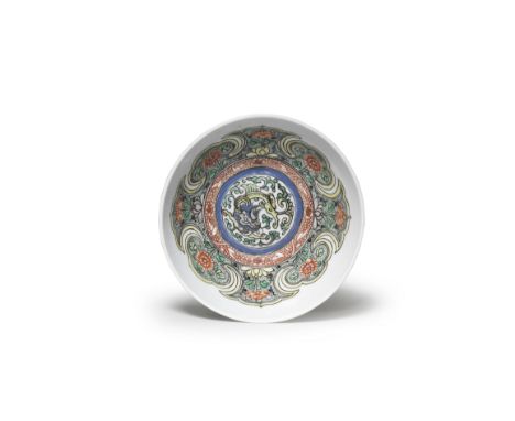 A SMALL FAMILLE VERTE 'CHILONG' BOWLKangxiFinely potted with rounded sides, the well slightly domed and decorated with a writ