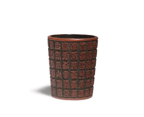 A VERY RARE CARVED CINNABAR LACQUER '108 SHOU CHARACTERS' BRUSHPOT, BITONGQianlong The cylindrical vessel crisply carved thro