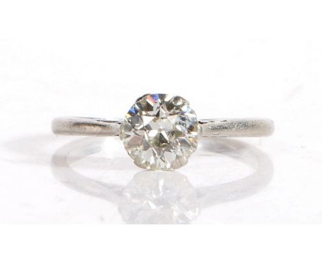 Diamond solitaire ring, the claw set diamond measuring 0.87ct, with pierced shoulders, the band unmarked, ring size K