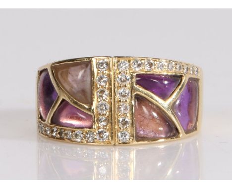 18 carat gold diamond and amethyst set ring, the geometric design with diamond edge to the tapering shank, 6.3 grams, ring si