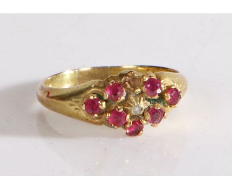 A Victorian 15 carat gold ruby and diamond set ring, assayed 1869, Birmingham, the central diamond with ruby surround, one st