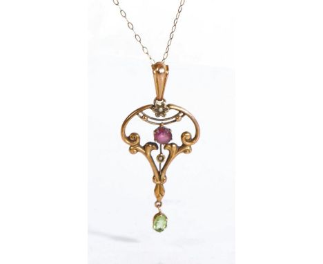 Art Nouveau pendant necklace, the peridot, garnet and seed pearl set pendant on a 9 carat gold chain, the pendant 43mm long, 