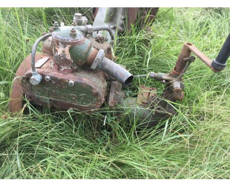 A Vintage static Stuart Engine with two cylinder engine attached fly wheel and top pump. 8HP maker Stuart Turner Henley on Th