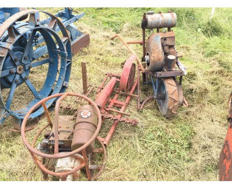An unusual Vintage Johnson engine a collection of vintage attachments. An unusual Jap engine single cast iron wheel garden en