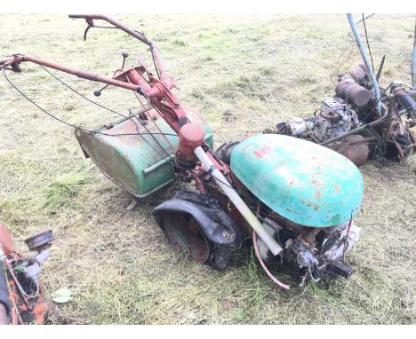A Vintage Clifford garden Tractor tiller single cylinder engine finished in green and red.
