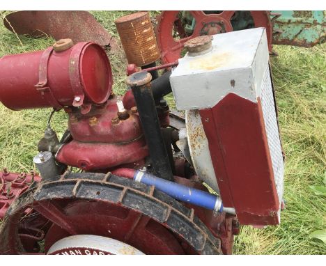 A Vintage American Beeman Garden Tractor. With a water cooled engine large steel wheels appearing to be in good order later p