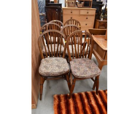 A set of six farm house kitchen chairs having hoop and stick back with yew or elm wood seats
NO MAJOR DAMAGE OR REPAIRS. AGE 