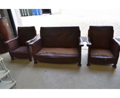 A fine three piece Art Deco leather club chair and sofa set, good solid frames and leather good with age