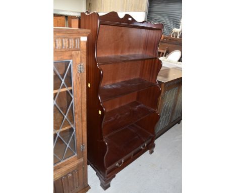 A modern mahogany effect book shelf