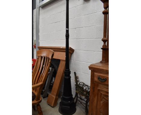A modern metal cast traditional style garden lamp base