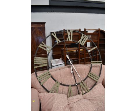 An oversized metal frame wall clock, diameter approx. 122cm
NOT TESTED FOR FUNCTIONALITY