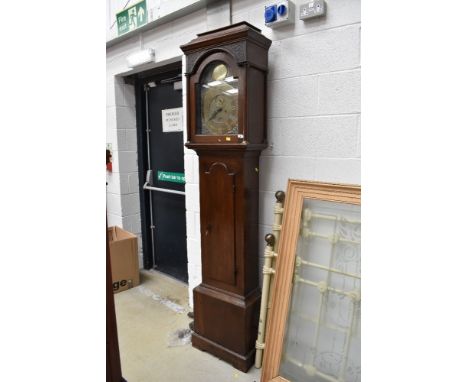 A late 18th Century oak cased long case clock having 8 day movement with 30cm brass face, recessed seconds and date aperture,