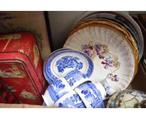 Three decorative wall plates showing country scenes, two large meat platters, a willow pattern part tea service (14 piece app