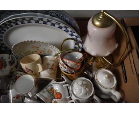 Three assorted meat platters, a vintage brass effect lamp with fluted glass shade, small collection of coronation ware mugs e