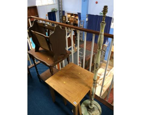 An oak occasional table, magazine rack and a part nest of tables and a lamp